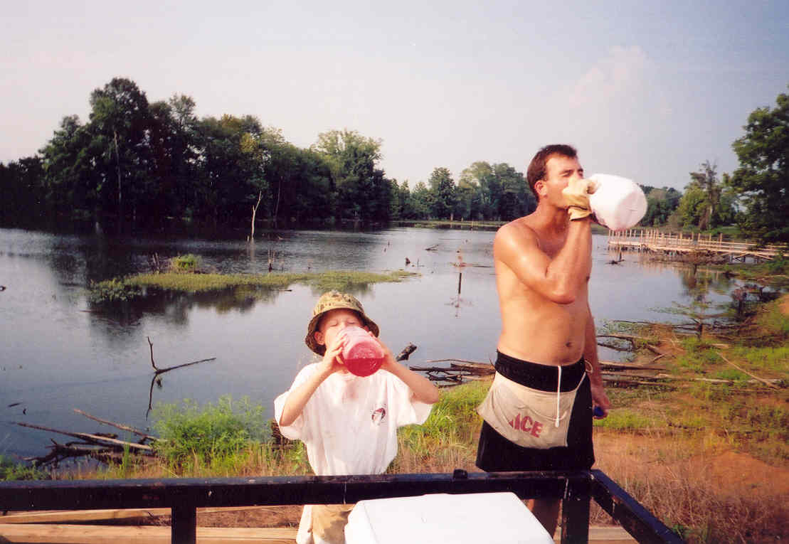 Chad and Hudson Wilson take a Gatorade break